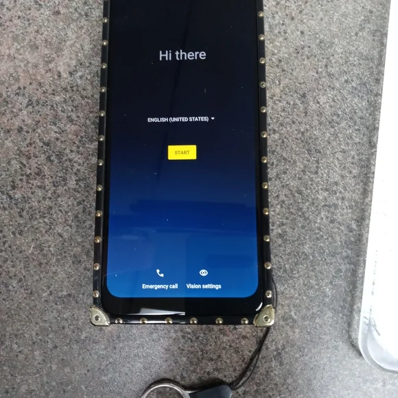 A Motorola G Play phone with case